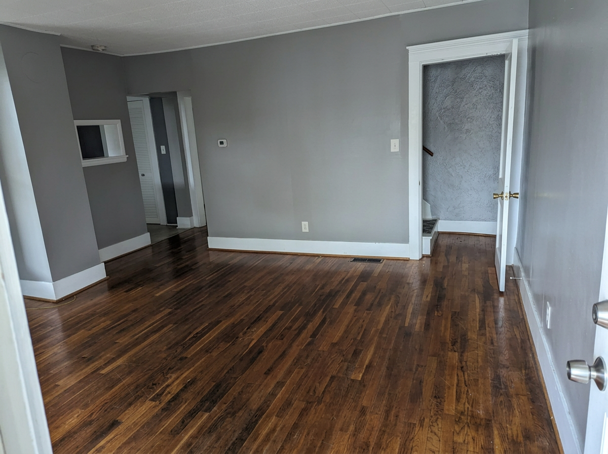 Entry and living room with hardwood floors