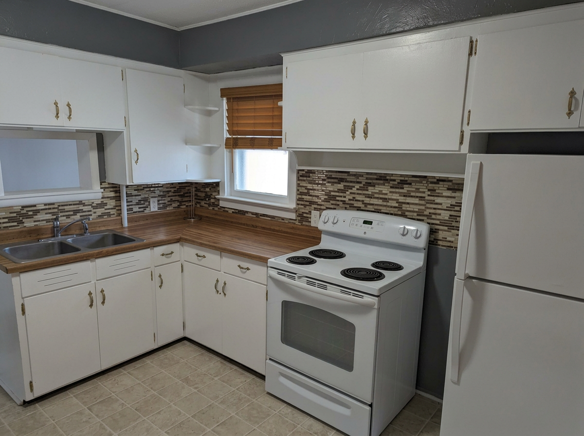 Kitchen counters, sink and cabinets